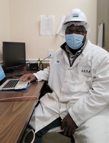 Koffi at work with mask 