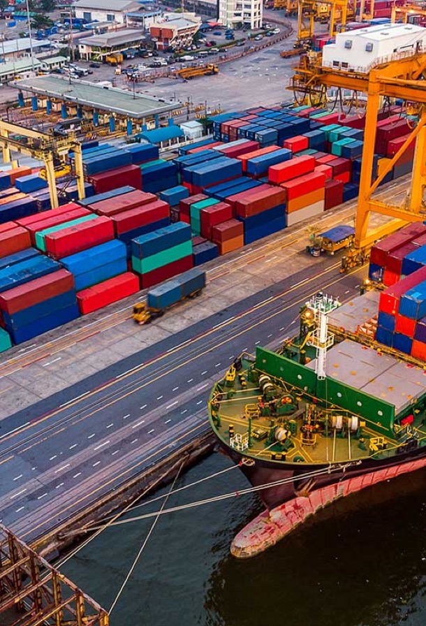 A ship docked by cargo dock.
