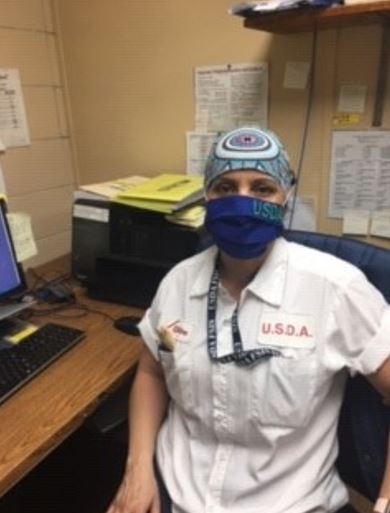 CSI Cristina Picazo in her USDA office at Establishment M278, a large beef slaughter and processing plant in Holcomb, Kansas.
