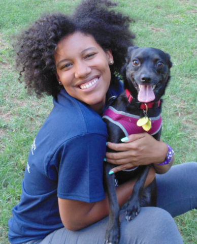 Woman hugging her dog
