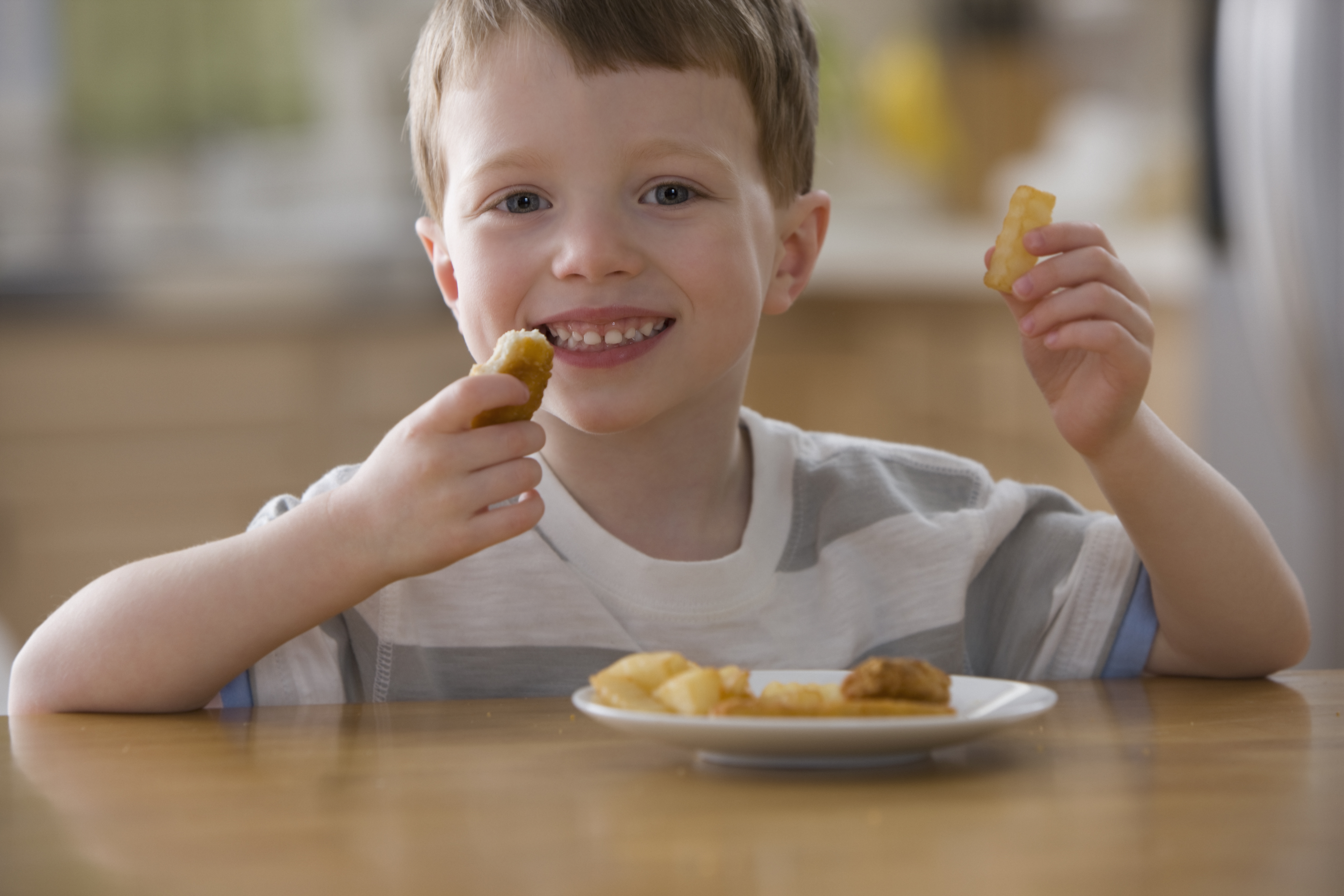 young child at lunch