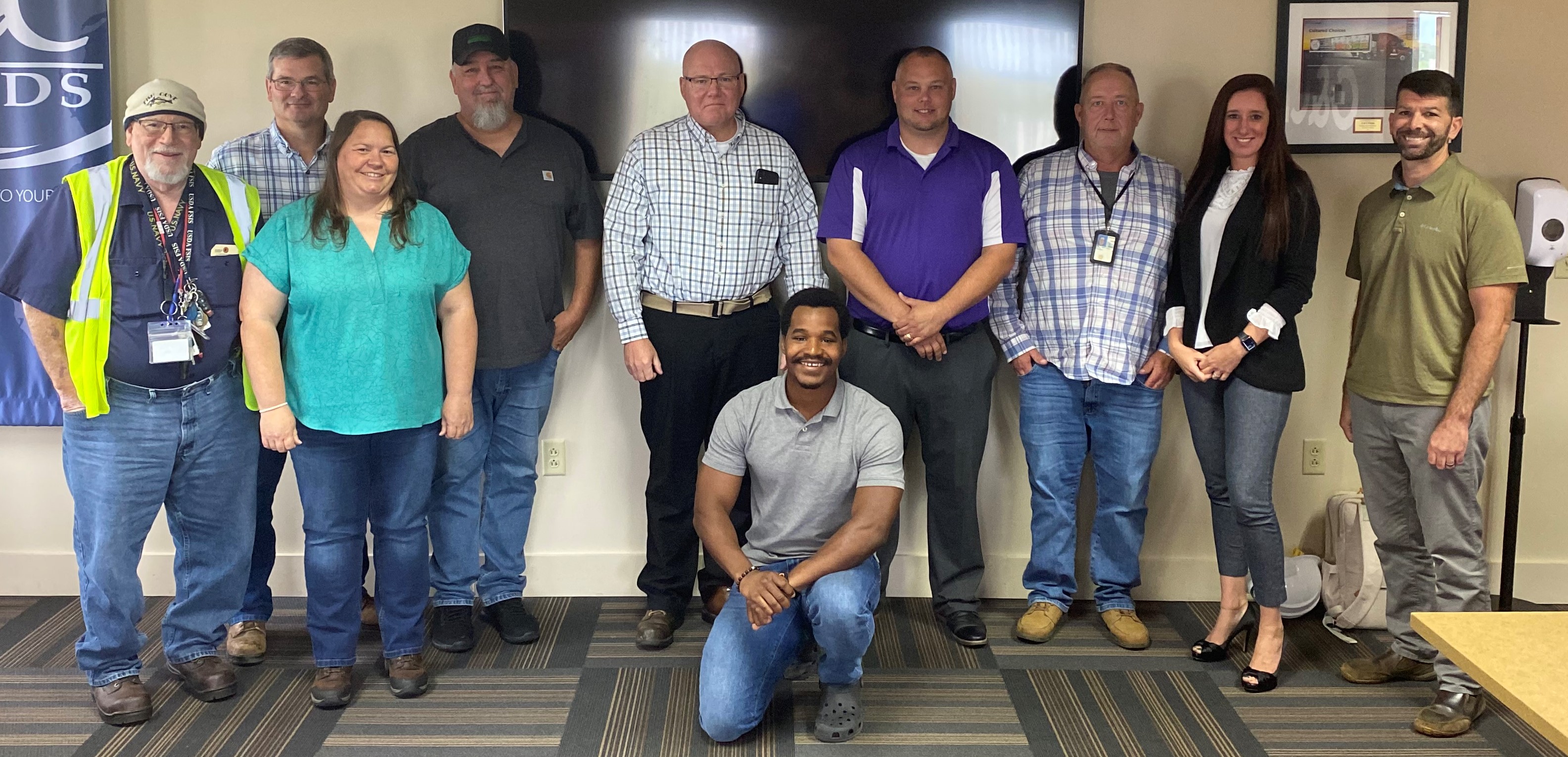 Group photo from Syracuse, N.Y. office