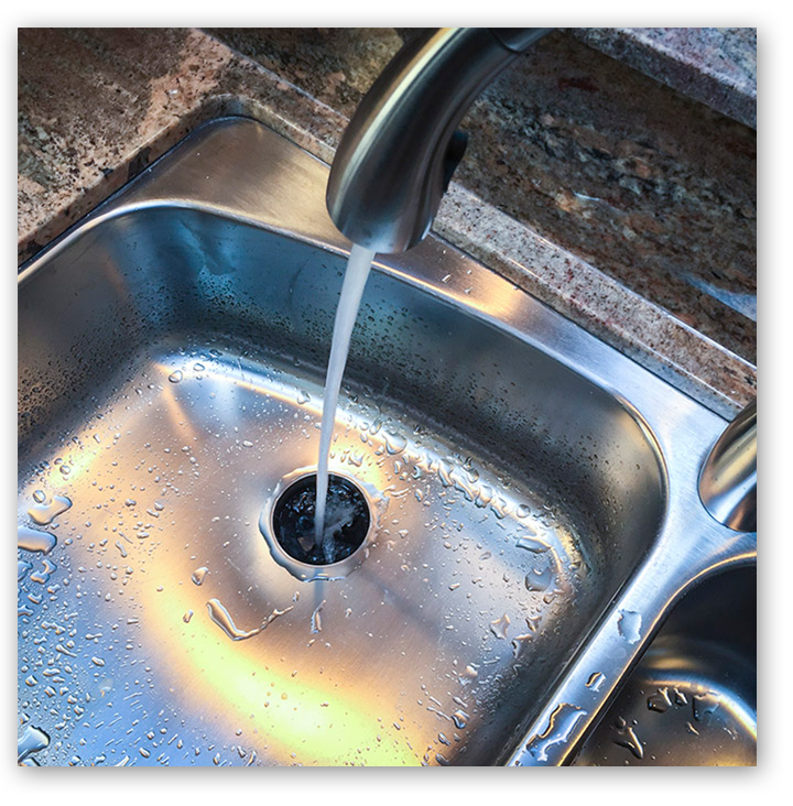 Water running at kitchen sink