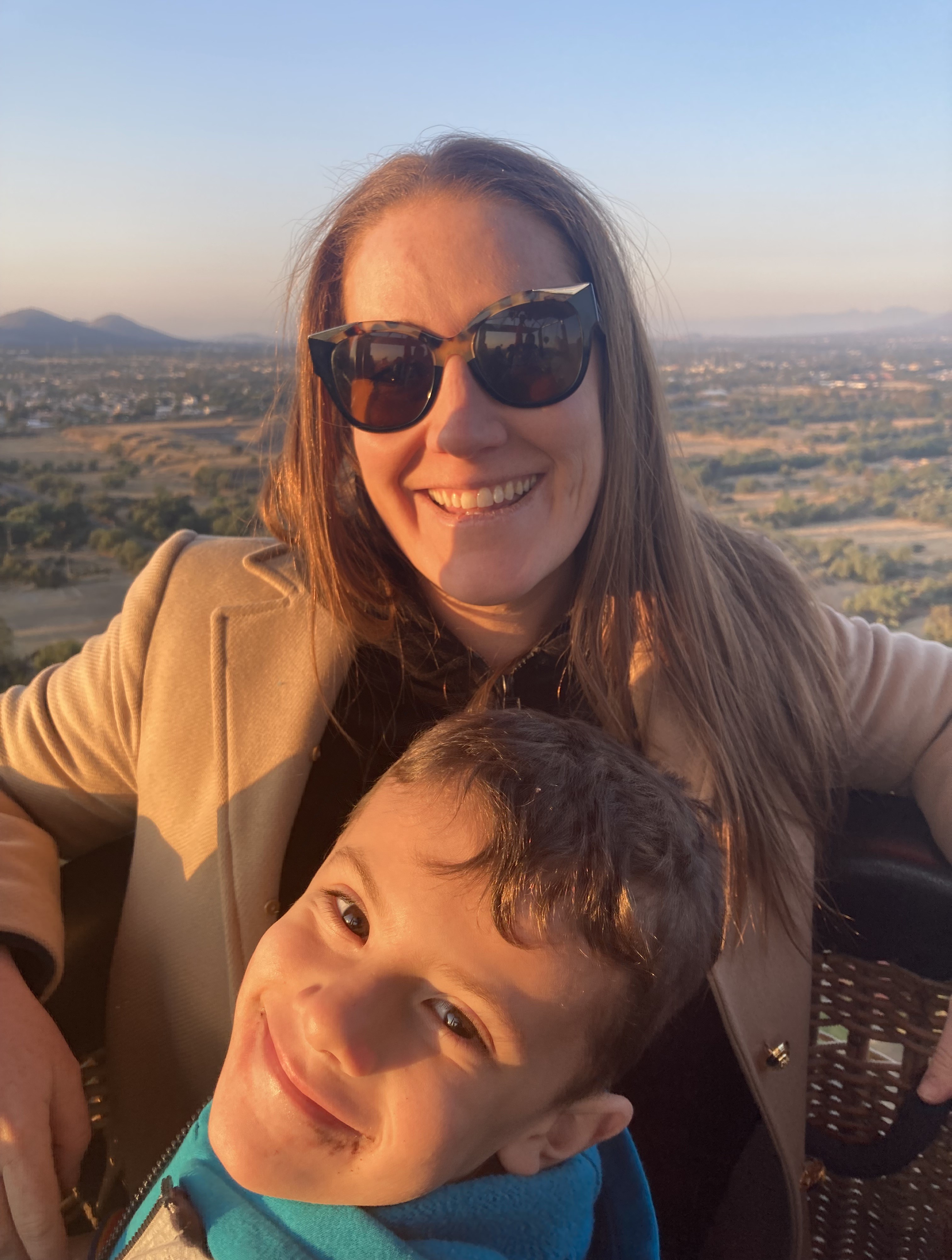 FSIS International Liaison Director in Mexico City Ciarra Toomey and her son enjoy a hot air balloon over Teotihuacan, Mexico.